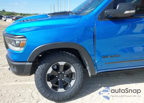 2022 Ram 1500 Rebel 4X4 5'7 Box z USA, uszkodzony, nr VIN 1C6SRFLT1NN284764